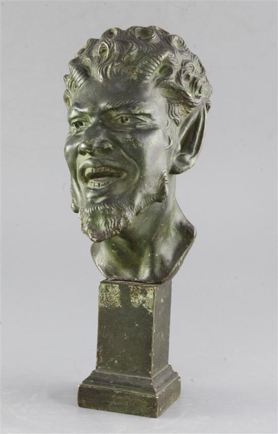 An early 20th century green patinated bronze mask of a laughing satyr, 12.5in.